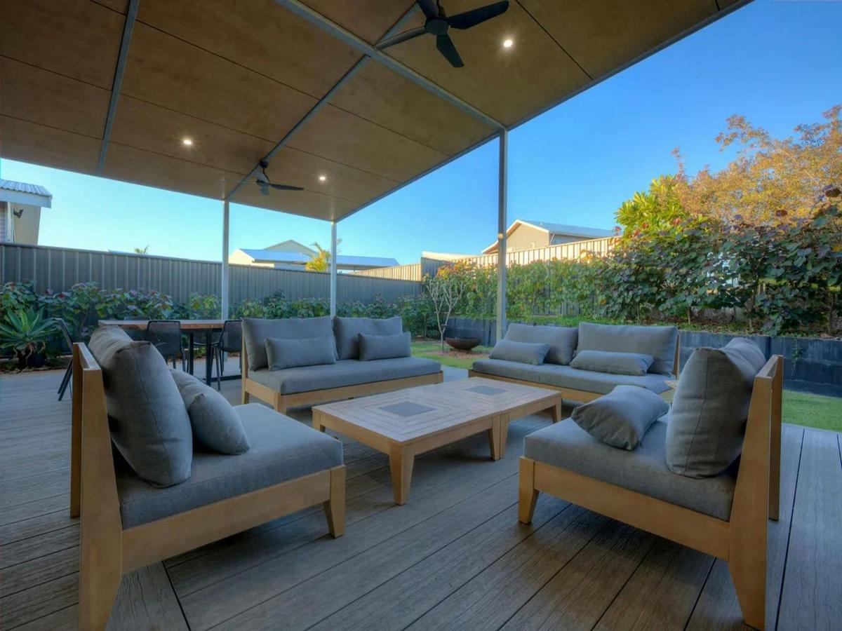 Comfortable covered outdoor lounge overlooking the private garden