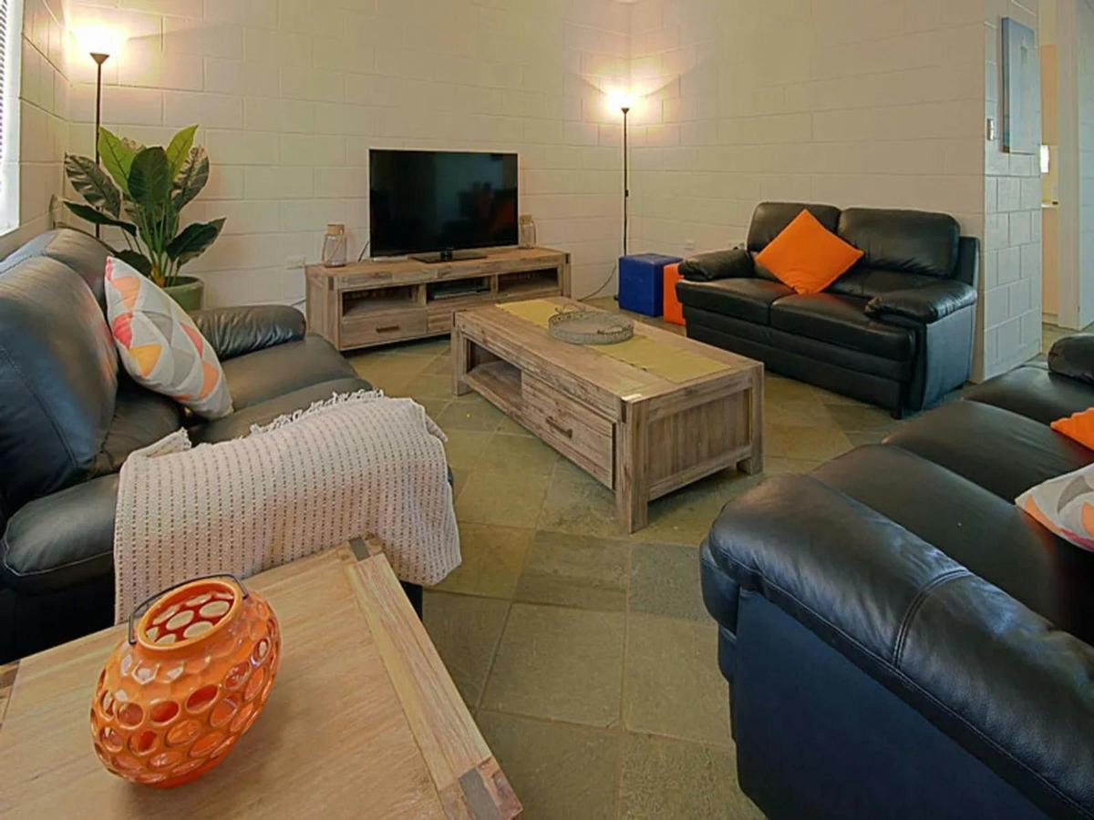 Comfortable living room with generous seating and a relaxed coastal feel