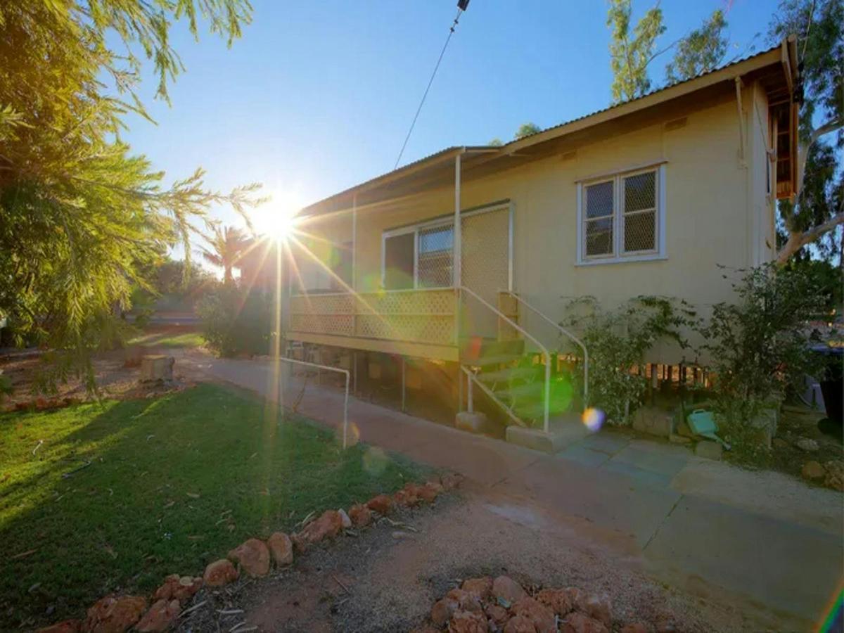 Charming holiday home with a covered porch and peaceful garden setting