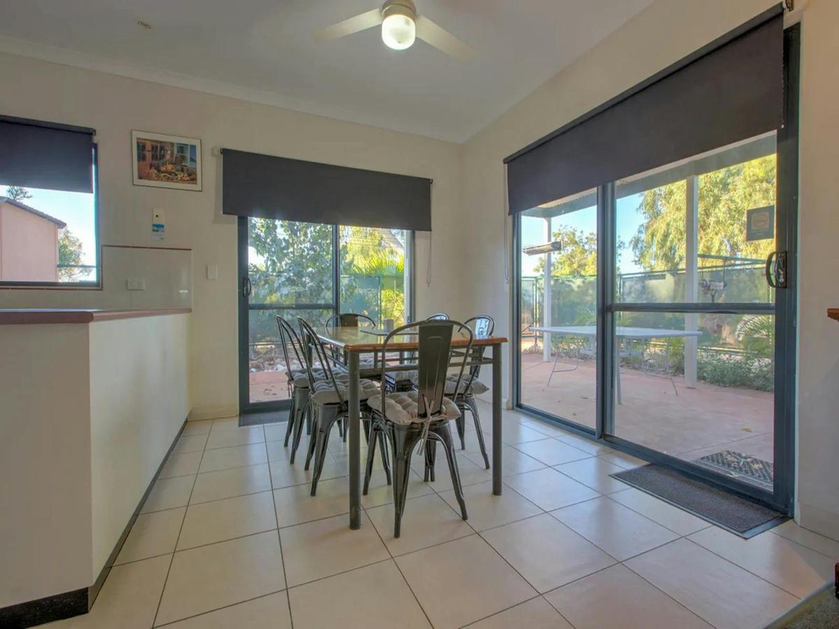 Light-filled dining area with easy access to the outdoor patio