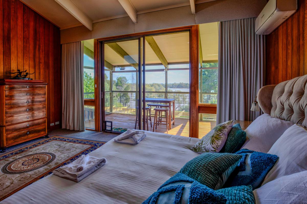 master bedroom with balcony