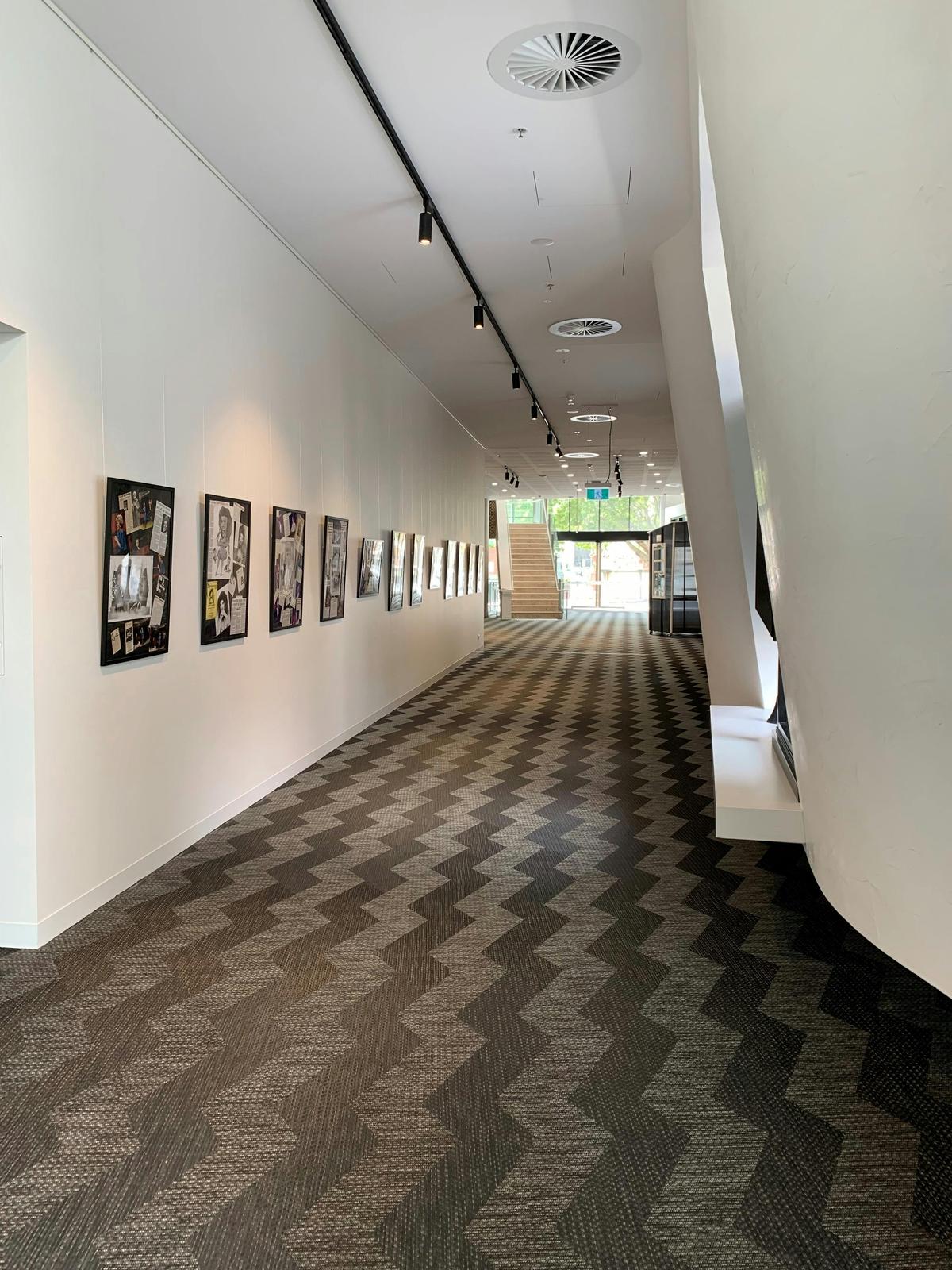 Interior gallery photo looking east to maindoor on Crawford street