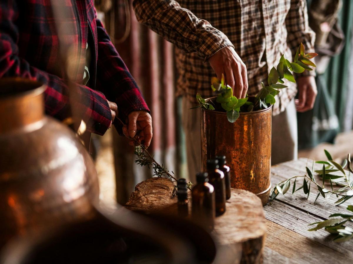 Hands-on botanical distillation at Lavender Goat Farm. Alt Text: