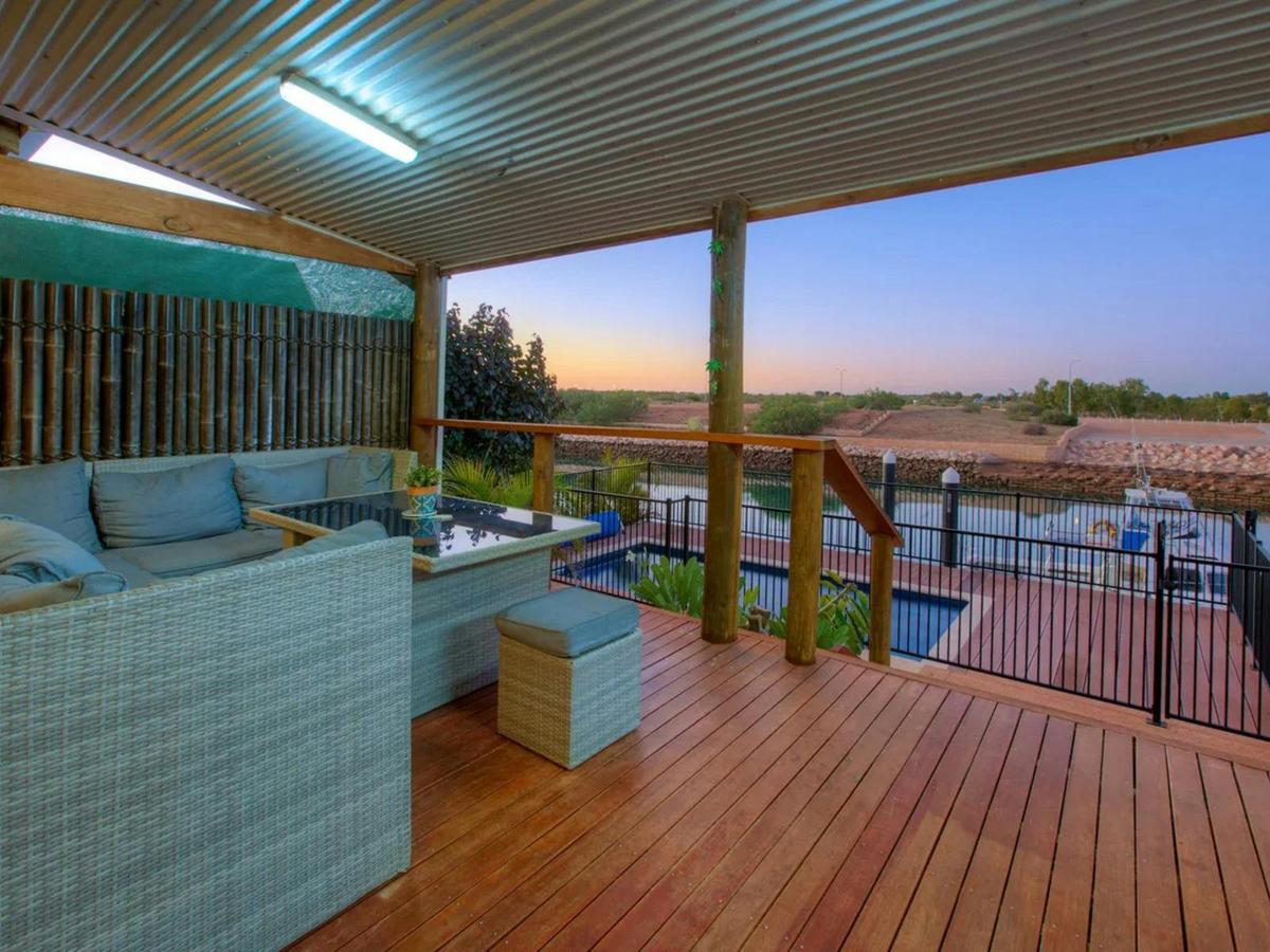The covered deck provides comfortable seating and beautiful views across the marina