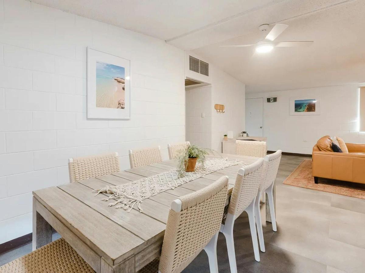 The open dining and living area provides a bright, comfortable setting for shared meals