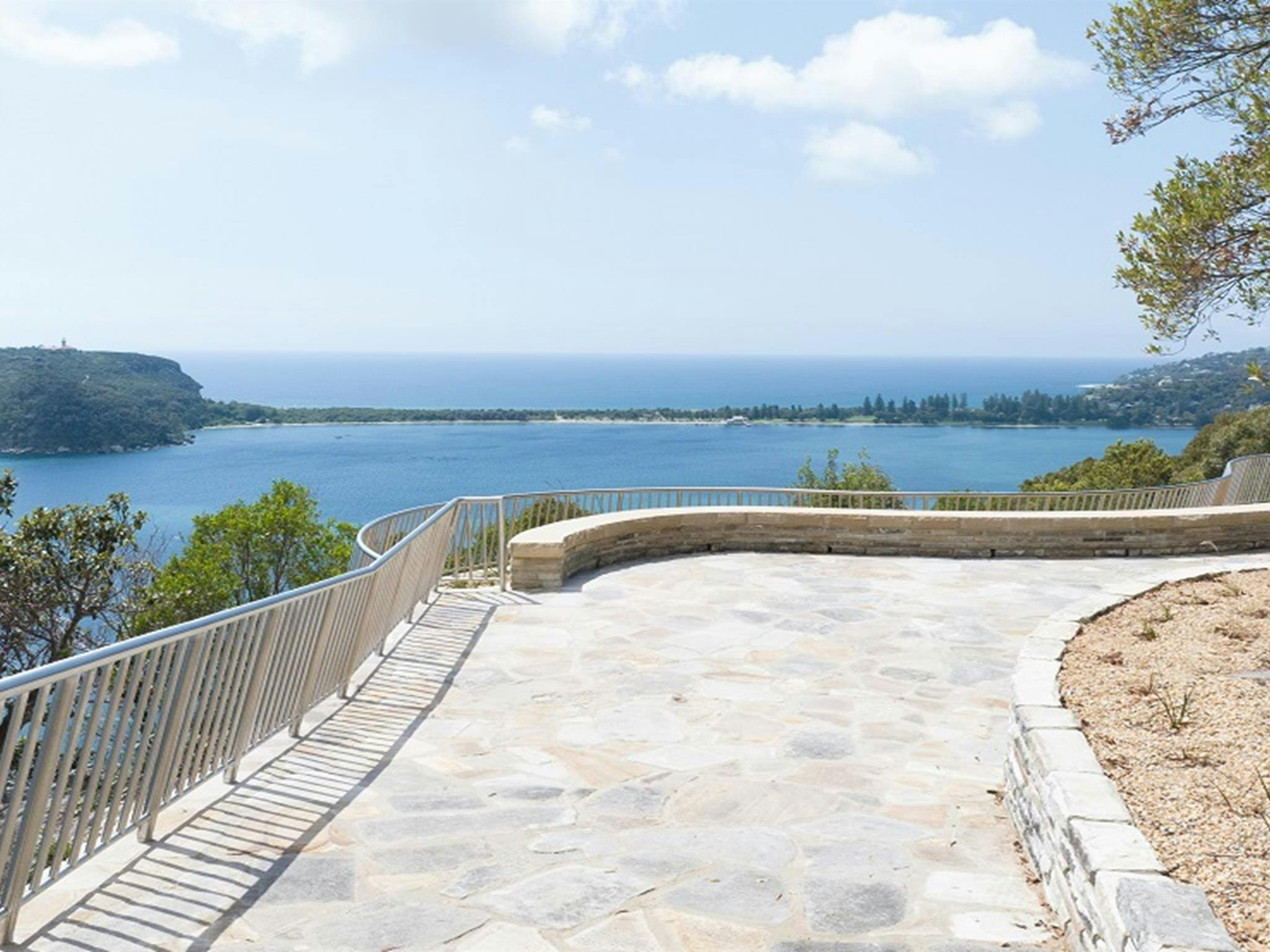 The view from West Head lookout, looking east to Palm Beach and Barrenjoey Head. Credit: Drew Elliot