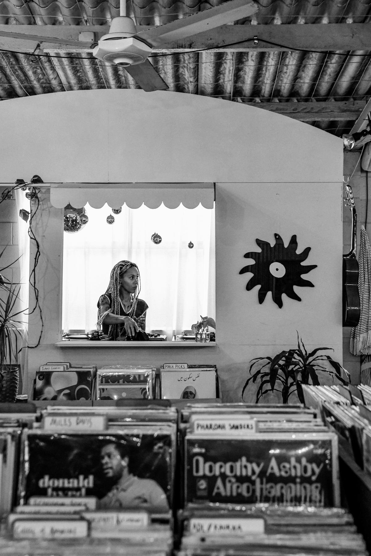 DJ Nantale spinning records in the shop