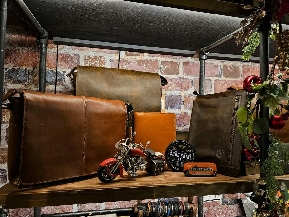 Indepal leather messenger bags and woven belt, styled with ties and gifts for him