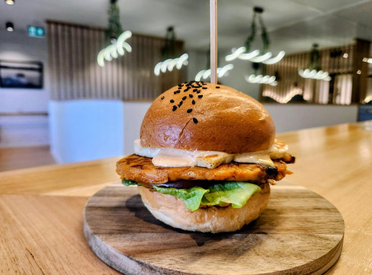 Our house-made veggie burger with grilled halloumi, tomato, lettuce and garlic aioli.