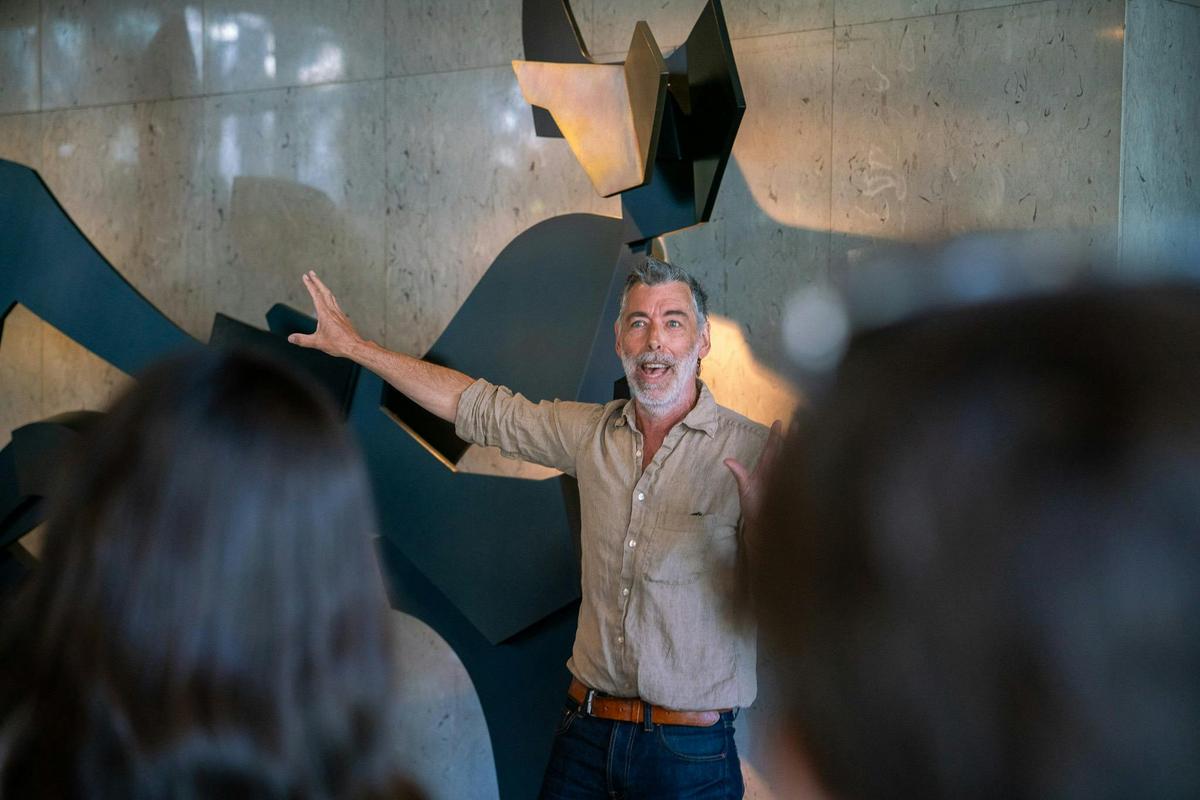 Nick shows a sculpture by Inge King