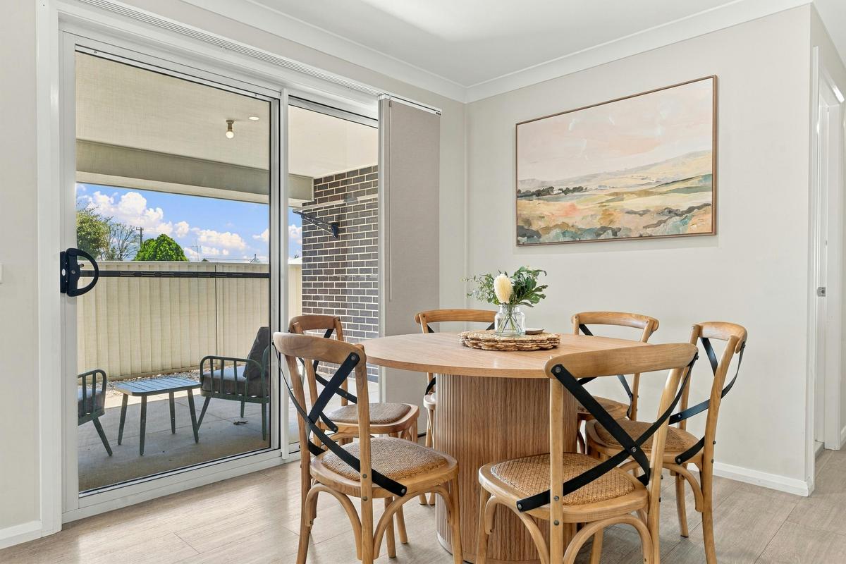 Dining table and chairs at Morrisset Retreat