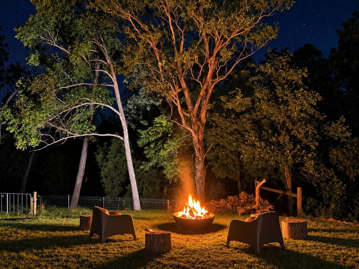 The fire pit overlooks the lake with comfortable seating to enjoy the evening