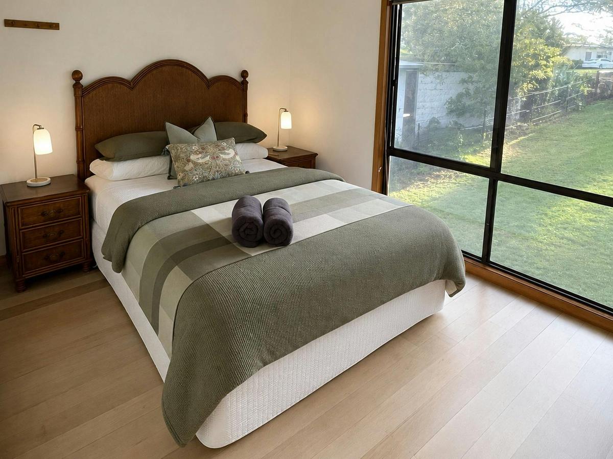 Bedroom 1 Queen bed with luxury linen