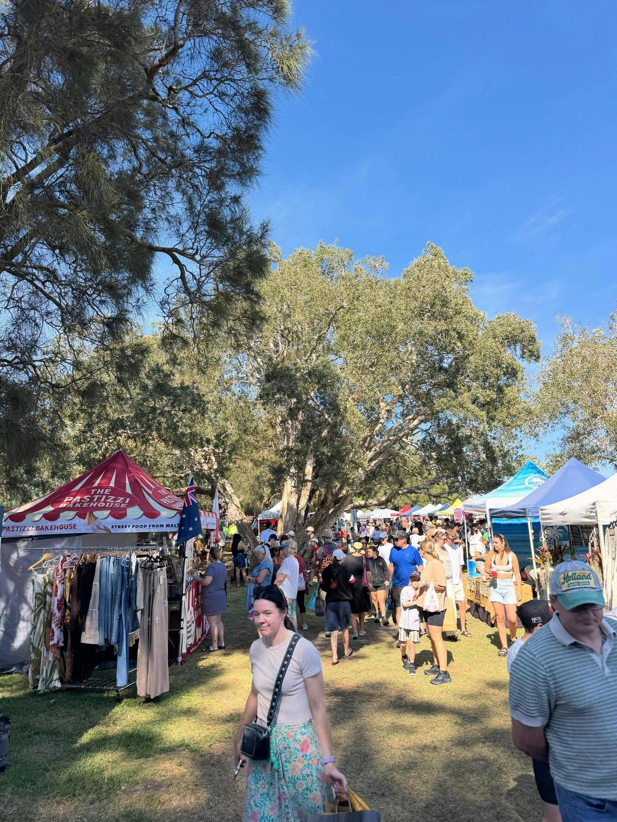 Colourful stalls and a vibrant atmosphere at Long Jetty Markets on the Central Coast.