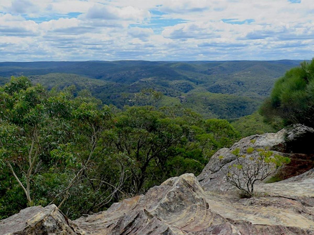 View from rocky ledge of Du Faurs lookout across the rugged and remote Wollangambe area. Photo