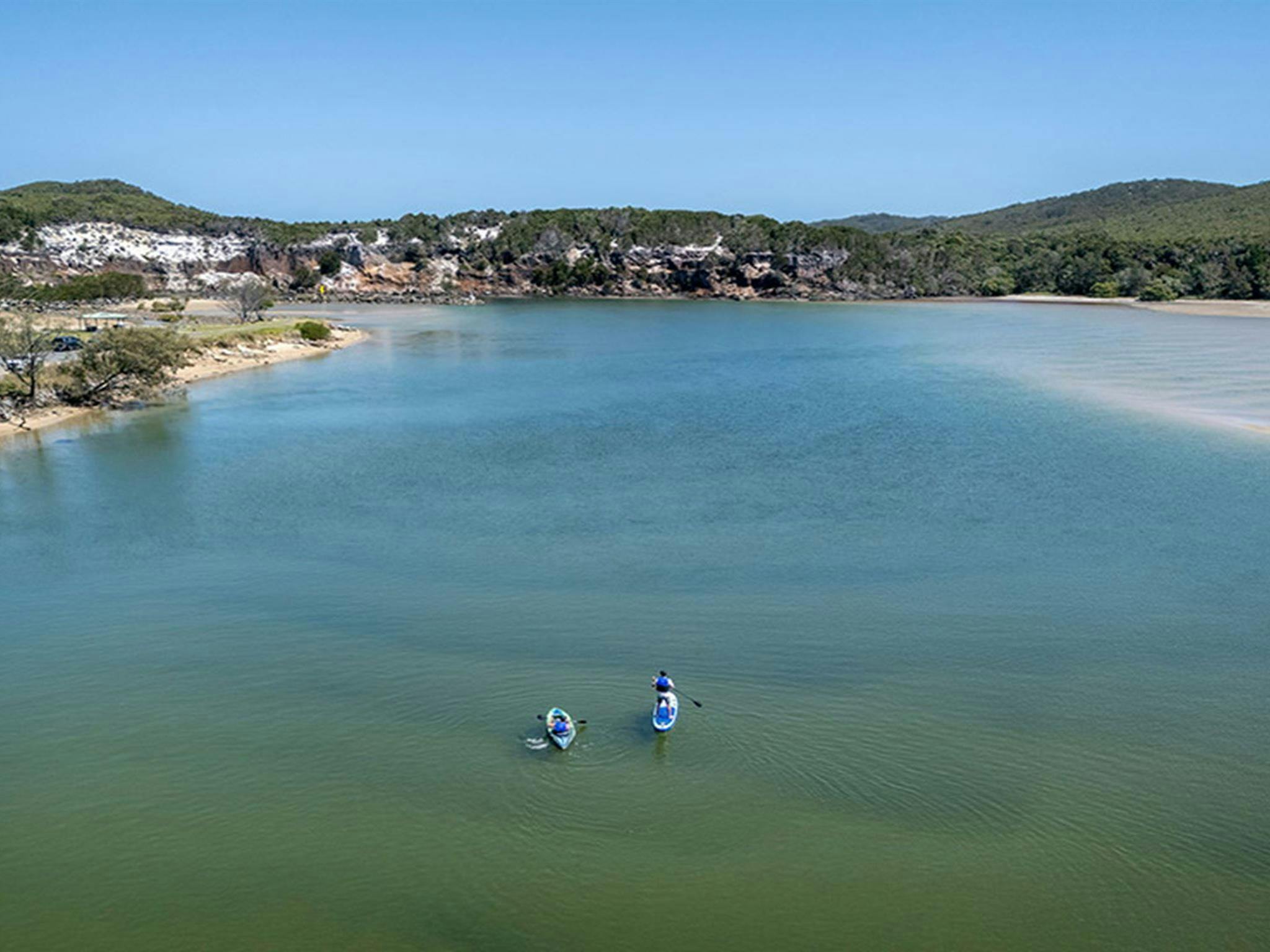 Visitors kayaking and stand up paddle boarding on Wooli Wooli River. Credit: John Spencer &copy;