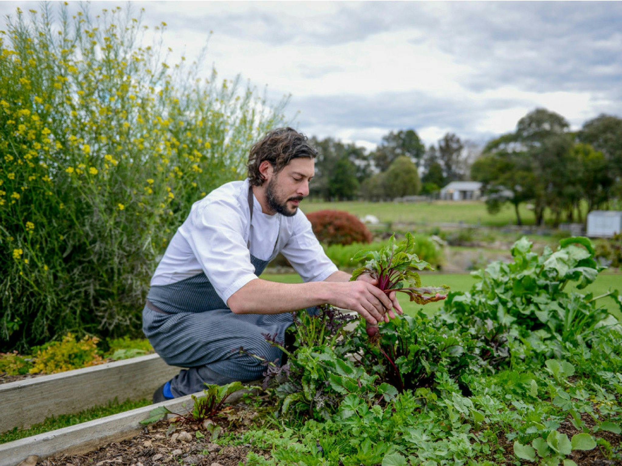 St Isidore (hatted) kitchen garden.