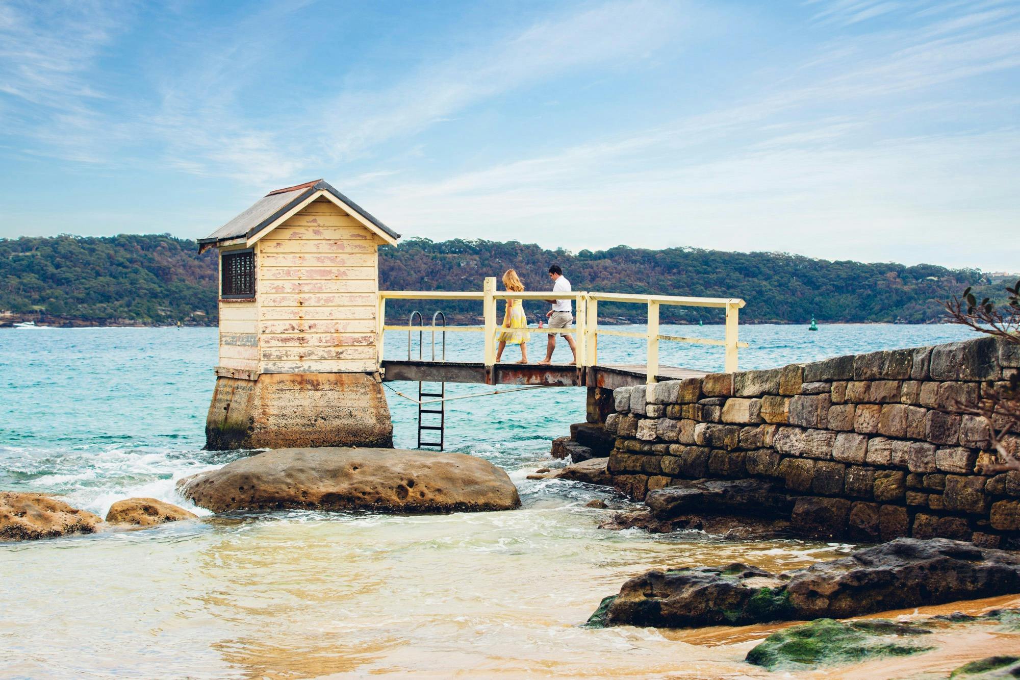 Couple enjoying a romantic walk by Camp Cove, Watsons Bay