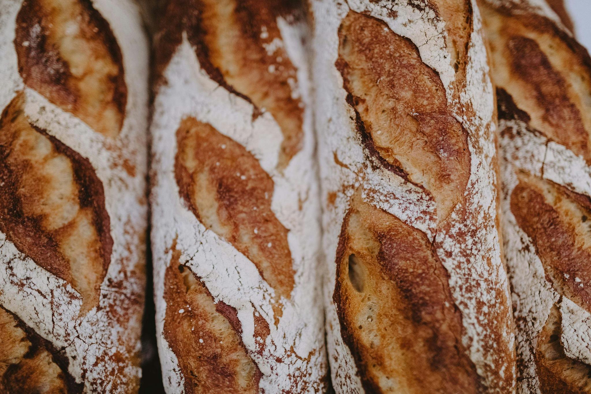 Close up image of a freshly made baguette at Wagga Wagga's Artisan Baker.