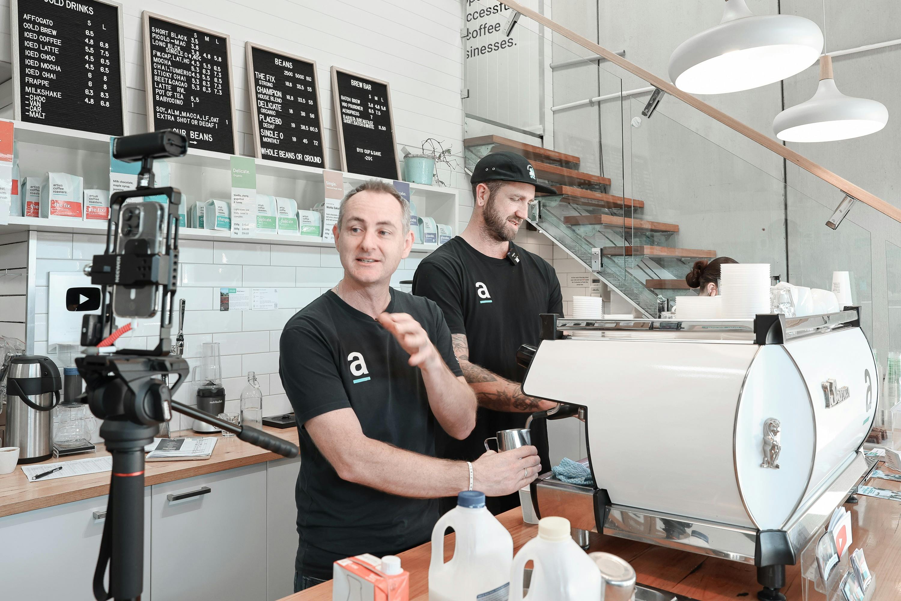 Luke & Jimmy on camera at Artisti Coffee Roasters