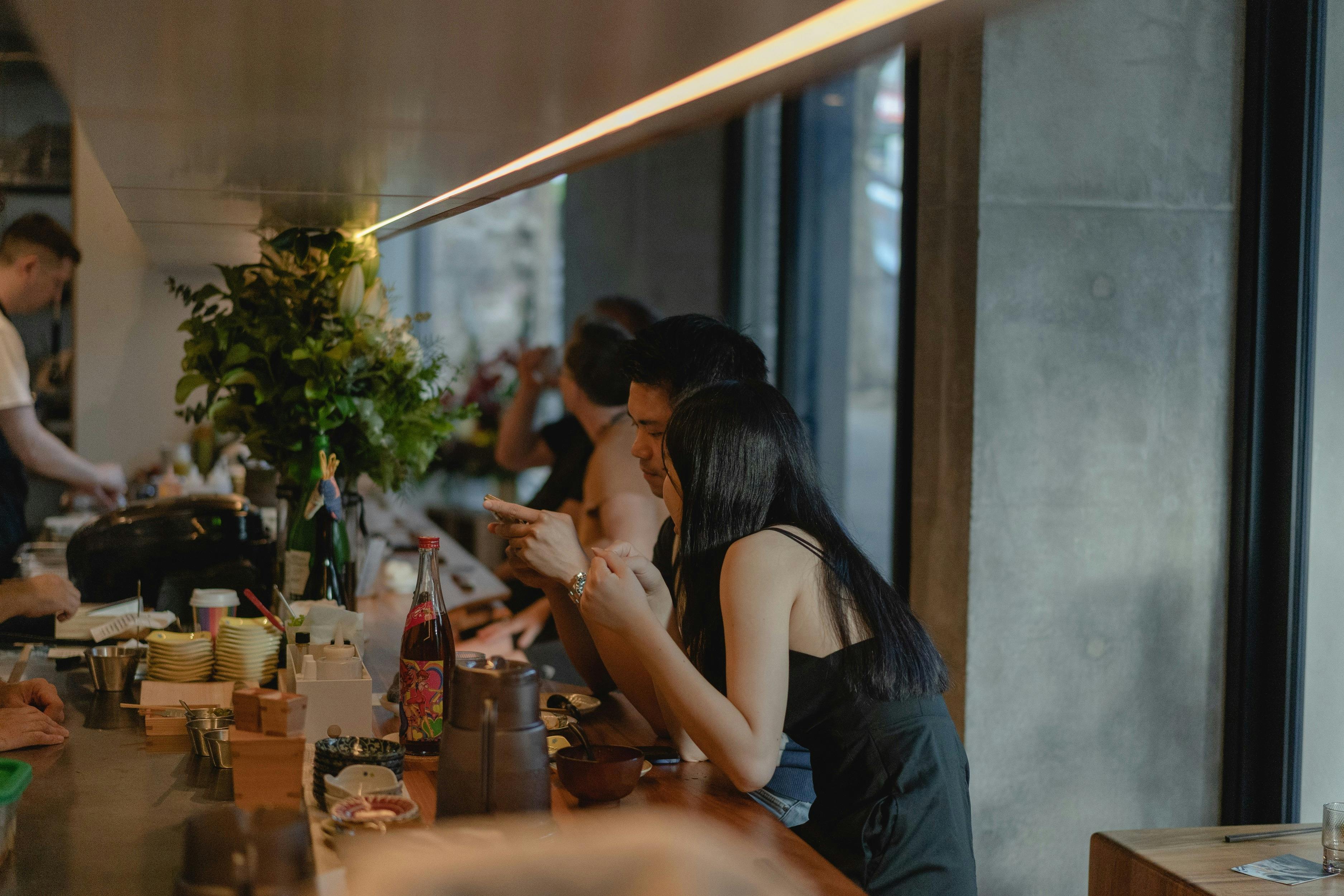 Two people dining at Amuro