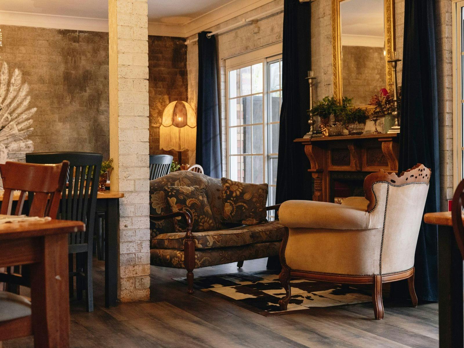 Relax in our heritage lounge—where comfort and charm create a warm, inviting atmosphere.