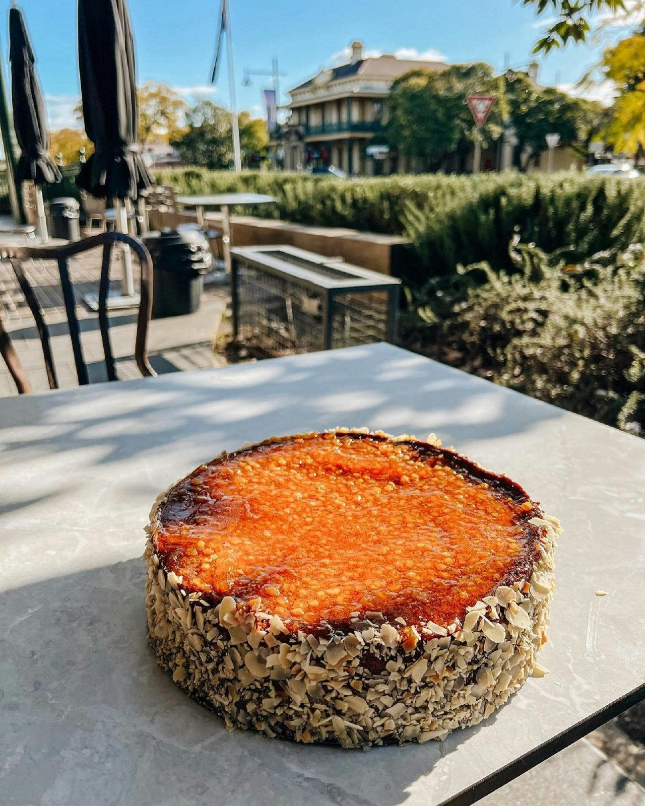 Cake on cafe table in street