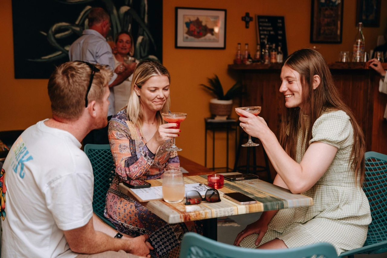 Guests enjoying a cocktail