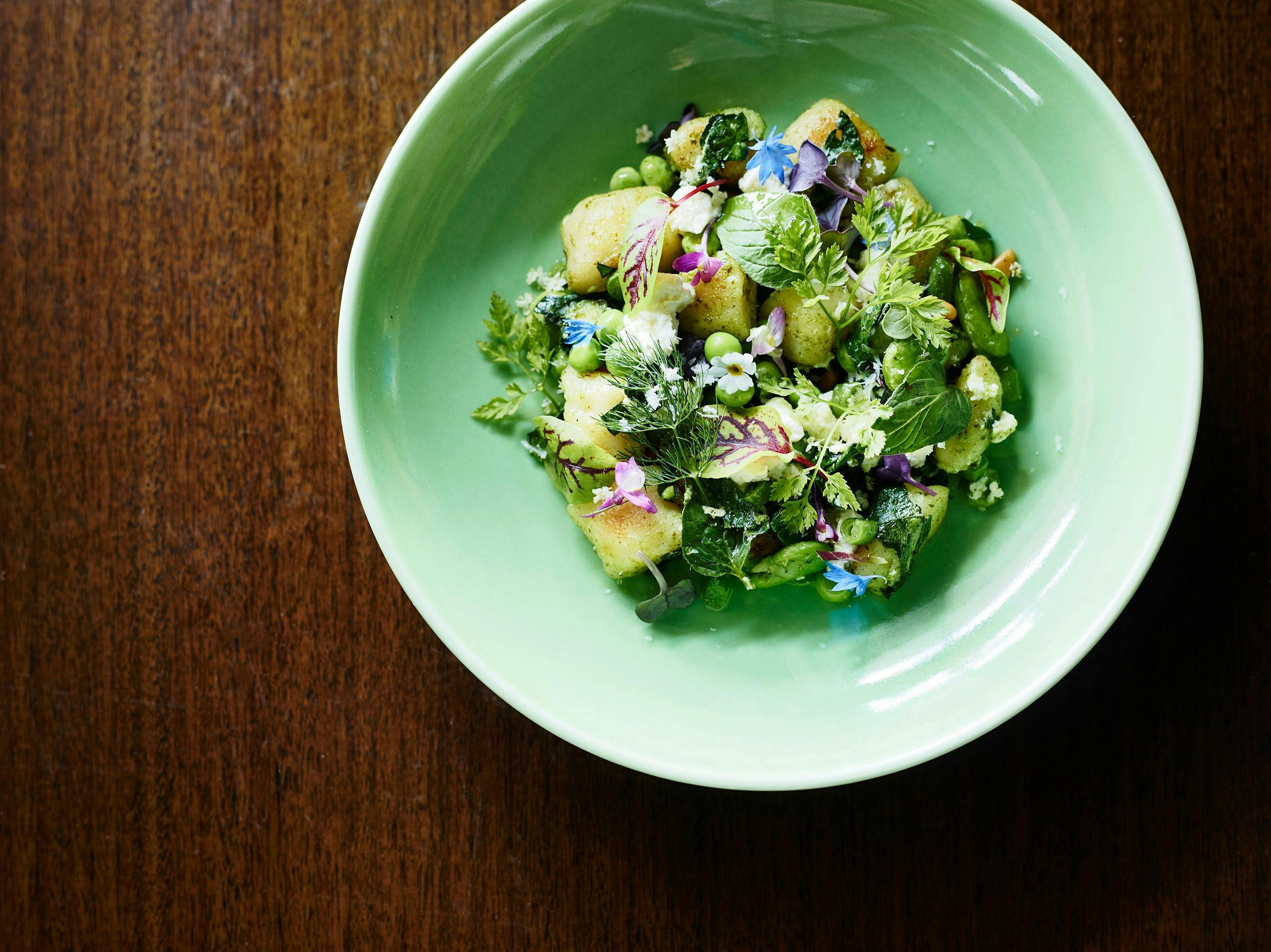 Potato gnocchi, buffalo ricotta, pea, broad bean, asparagus, pine nut