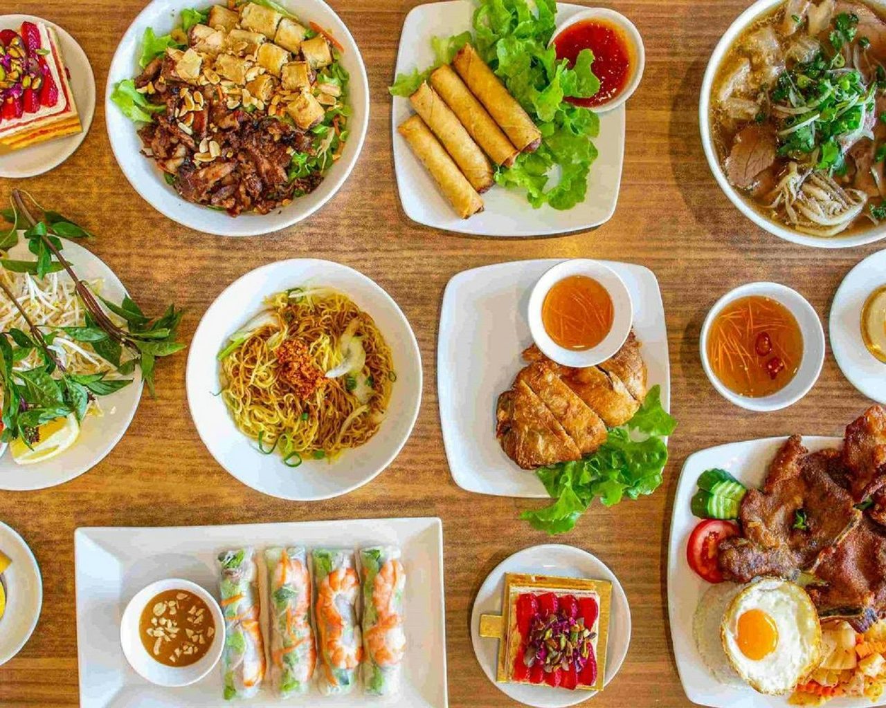 Table full of Vietnamese foods