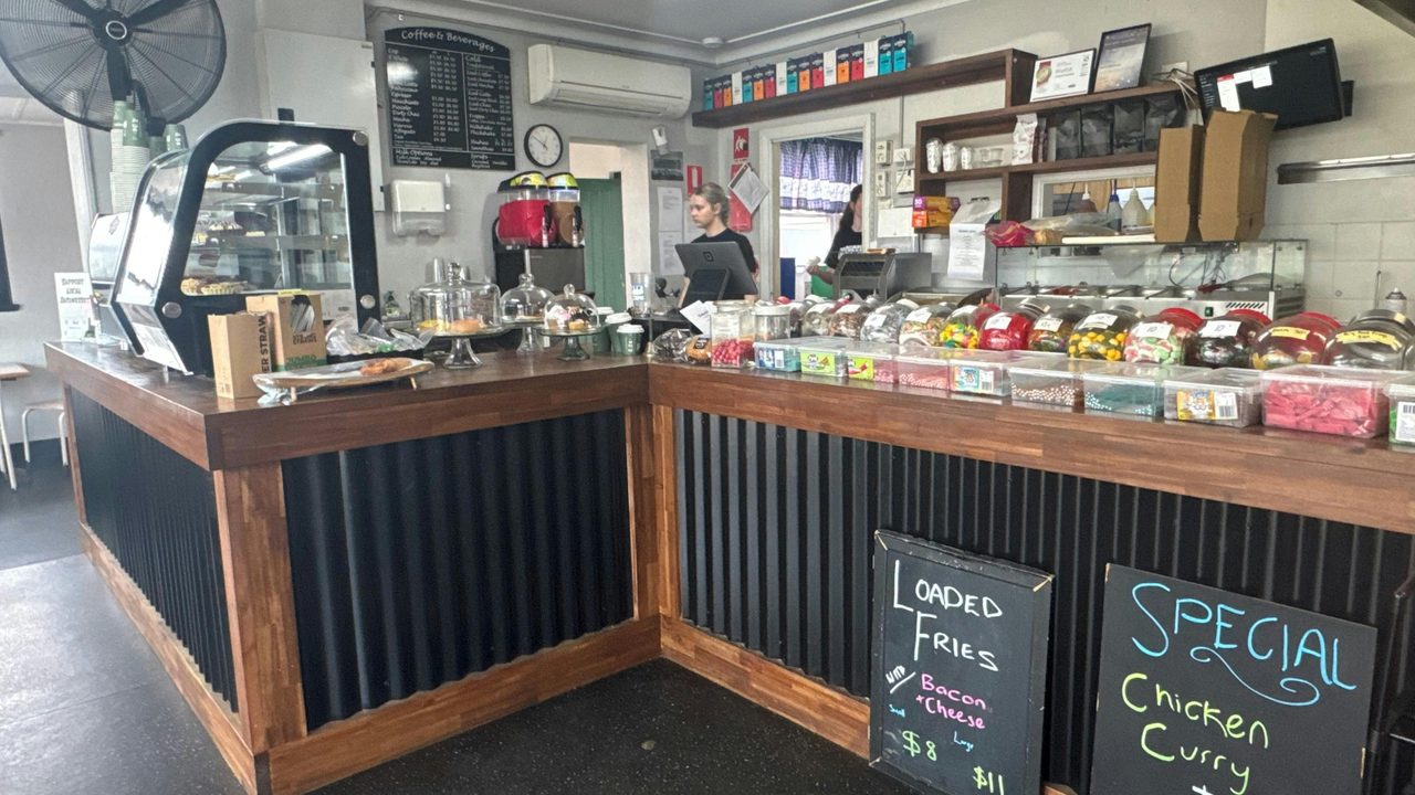 Inside counter with lollies and cakes