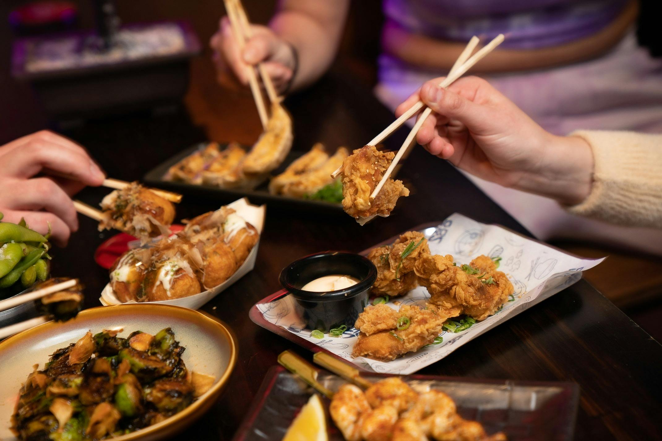 Chopsticks picking up food