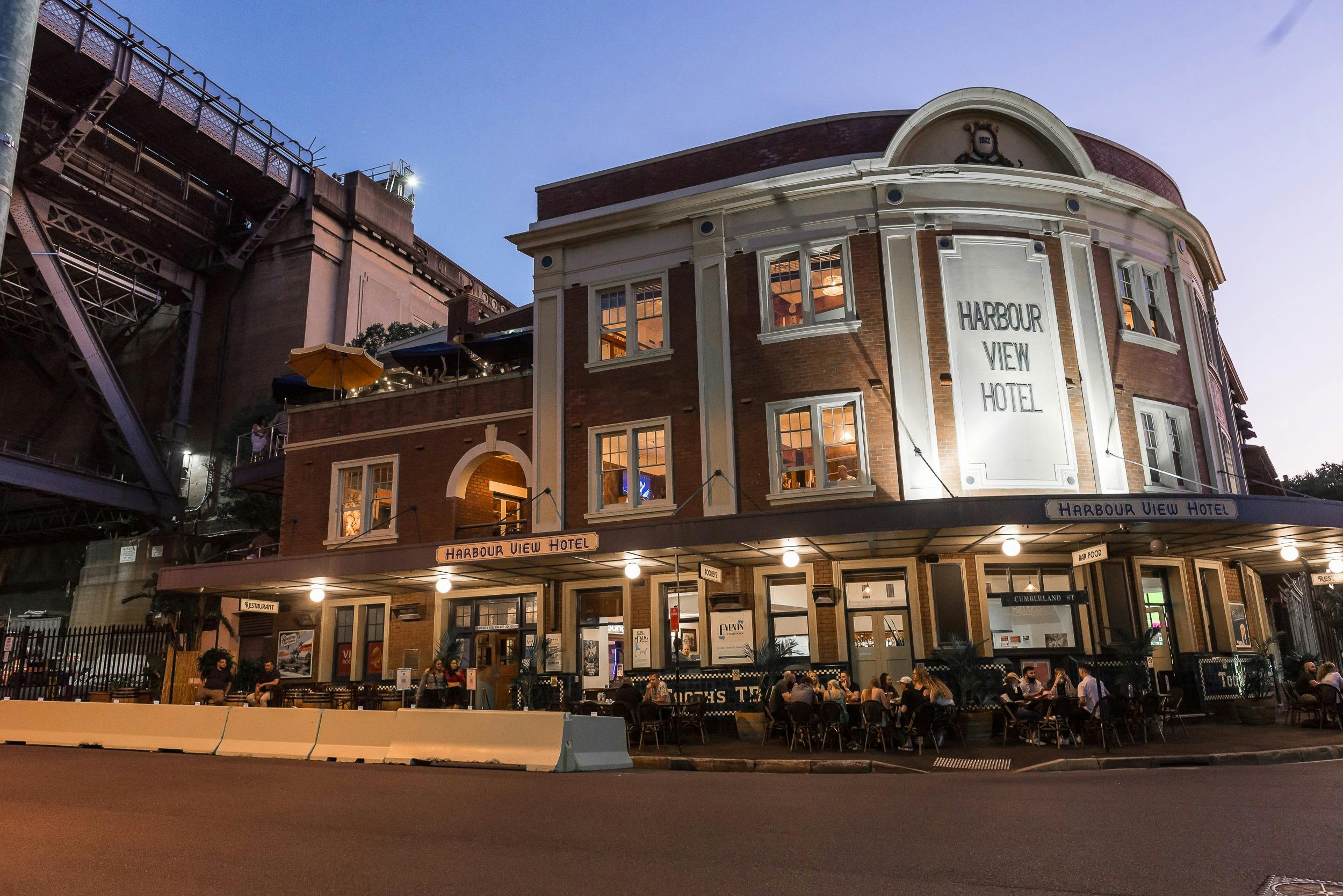 The exterior of the hotel at dusk