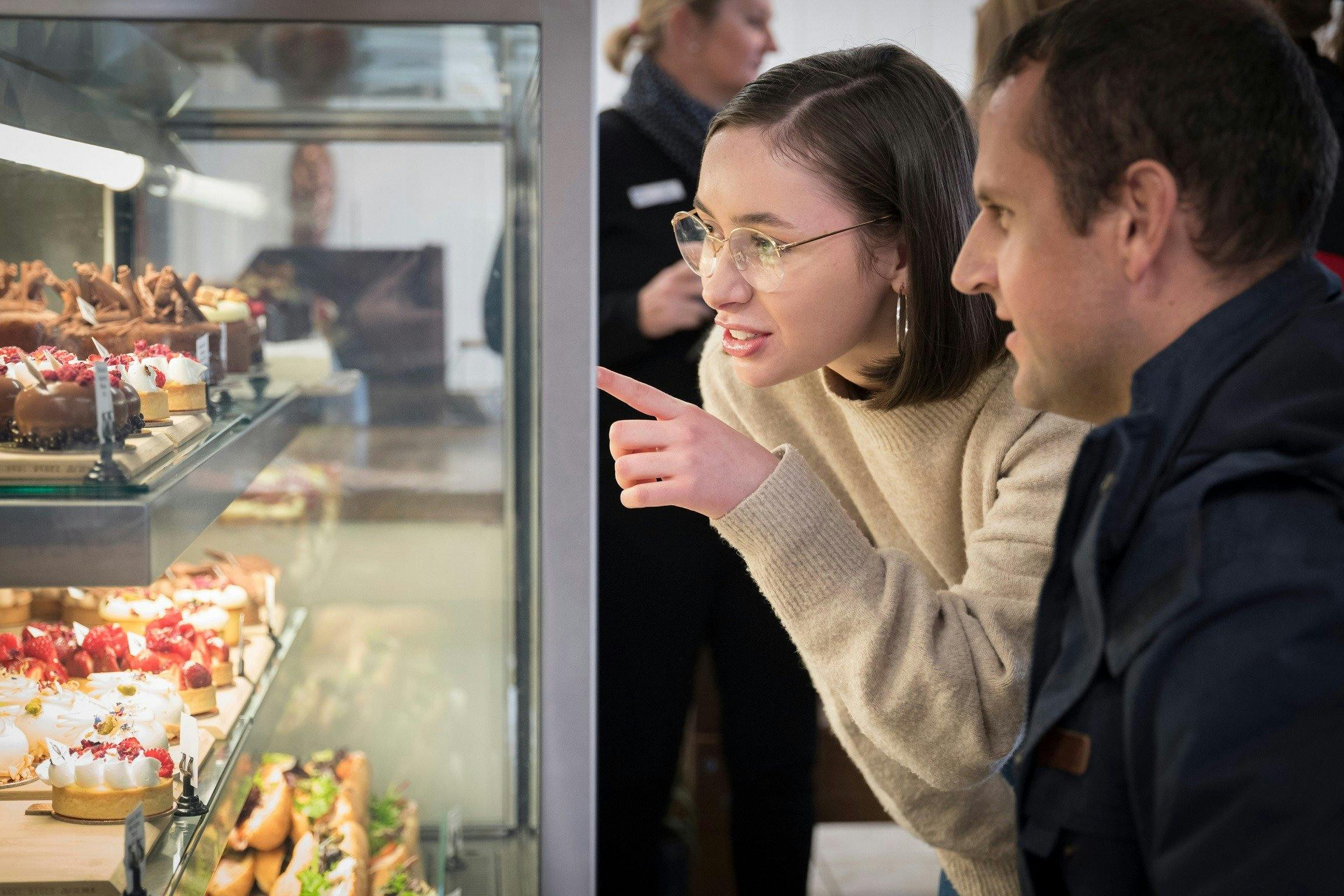 Trying to decide on what treat to choose at The Icky Sticky Patisserie