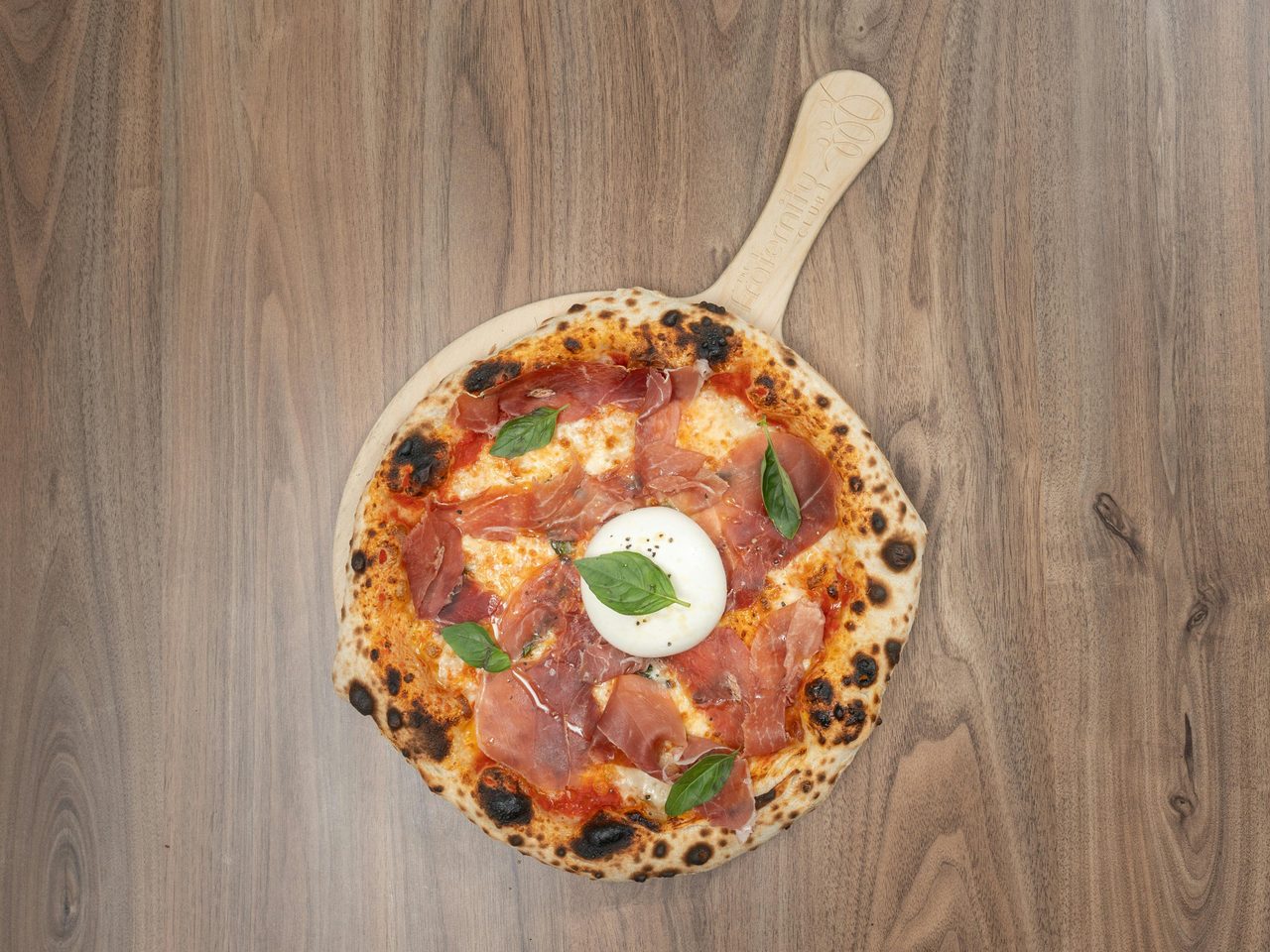 Mouth watering Burrata & Prosciutto Pizza