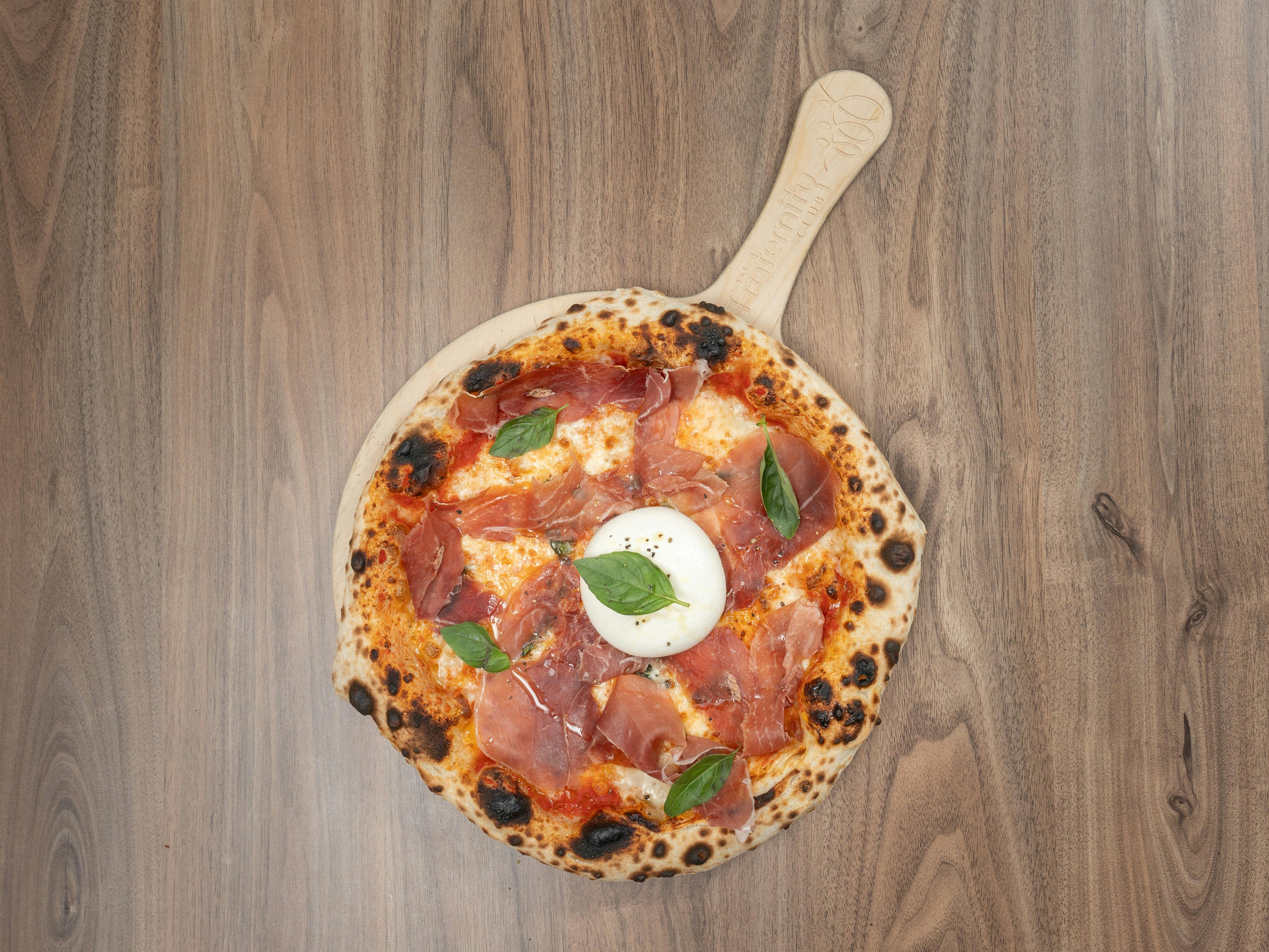 Mouth watering Burrata & Prosciutto Pizza