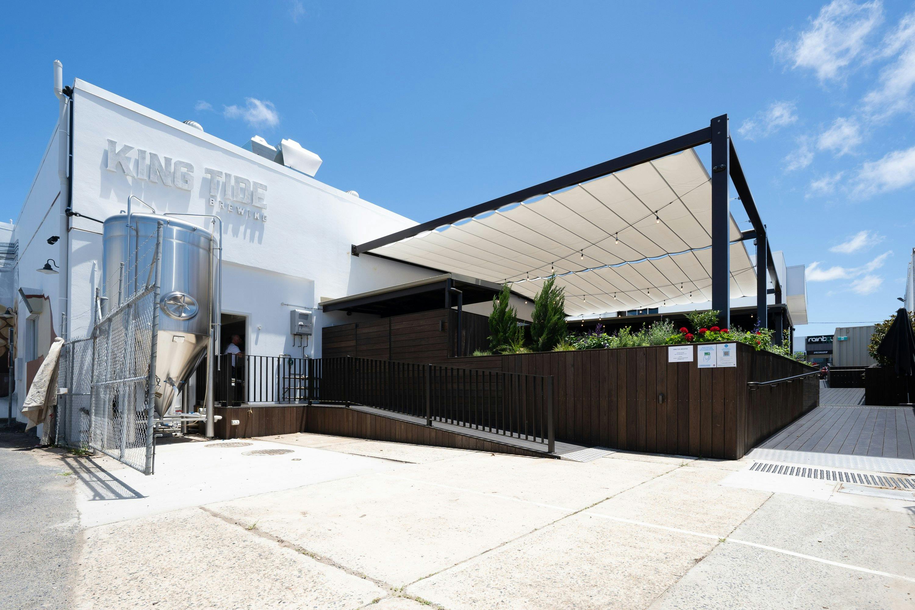 entrance picture of the building with logo on the wall
