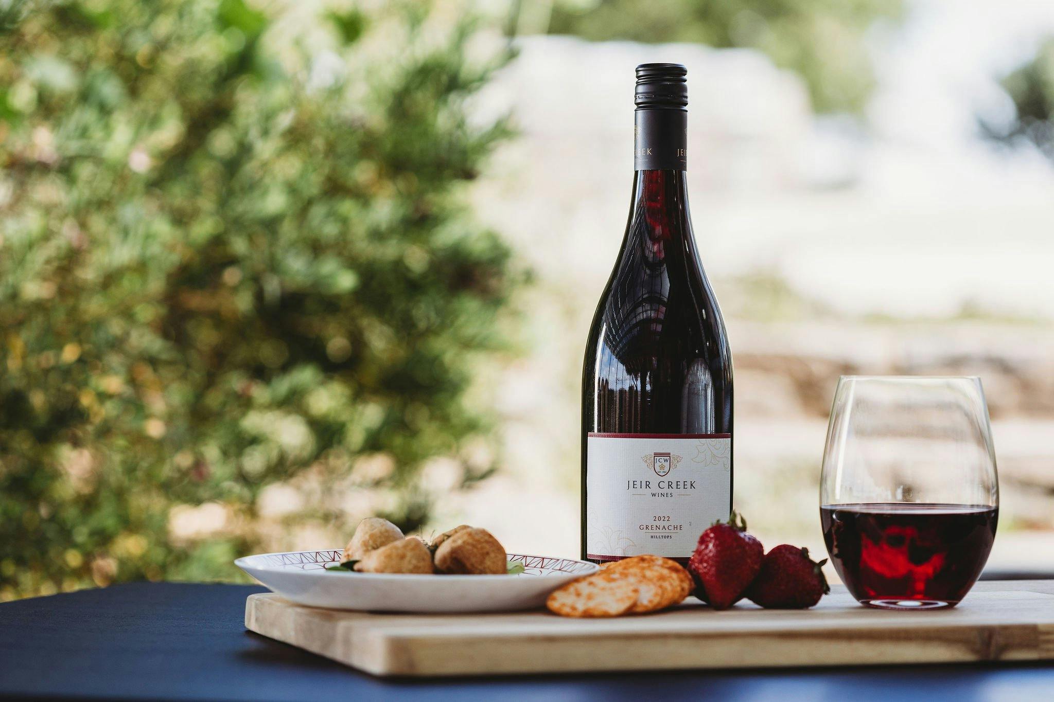 Indulge in the symphony of flavors as you sip on our exquisite Grenache, accompanied by delectable c