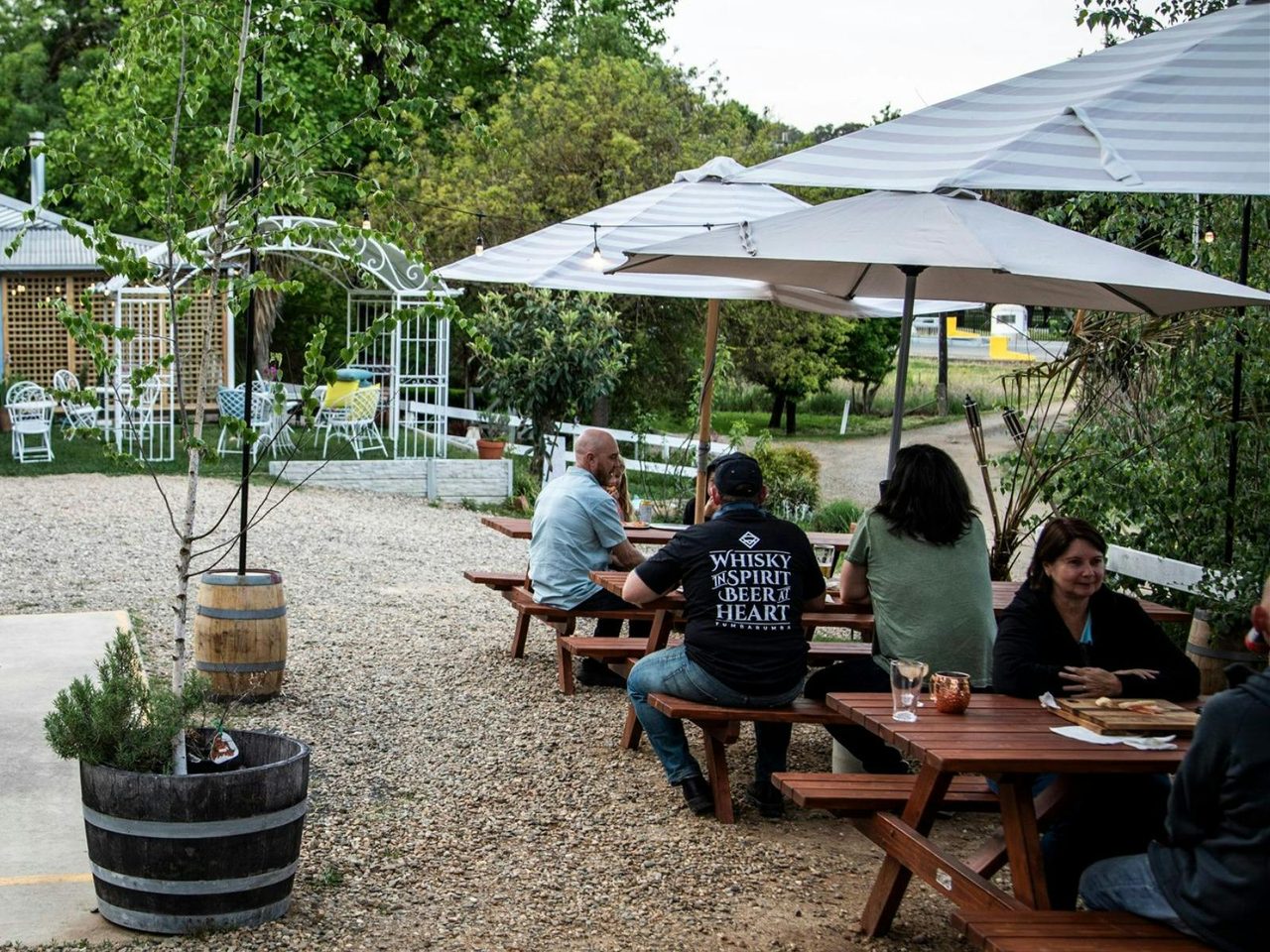 Enjoying pizza in the beer garden at the Ladbroken Distillery Brewhouse in Tumbarumba