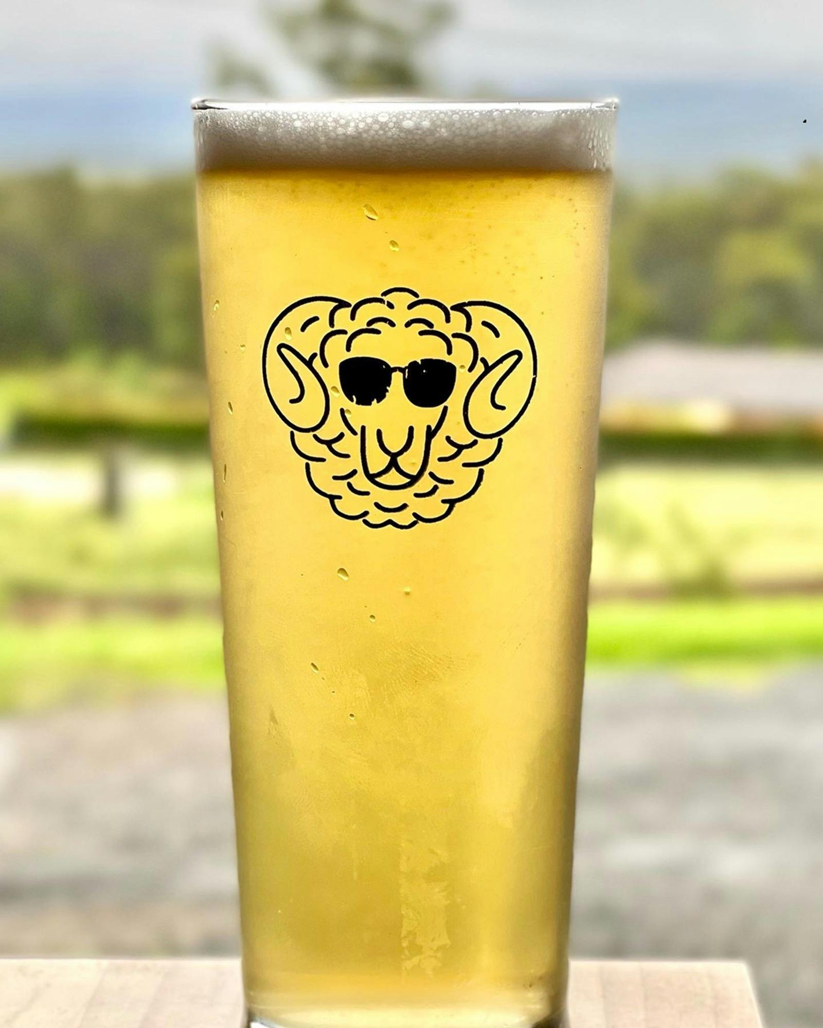 Glass of Pale Ale with sheep emblem