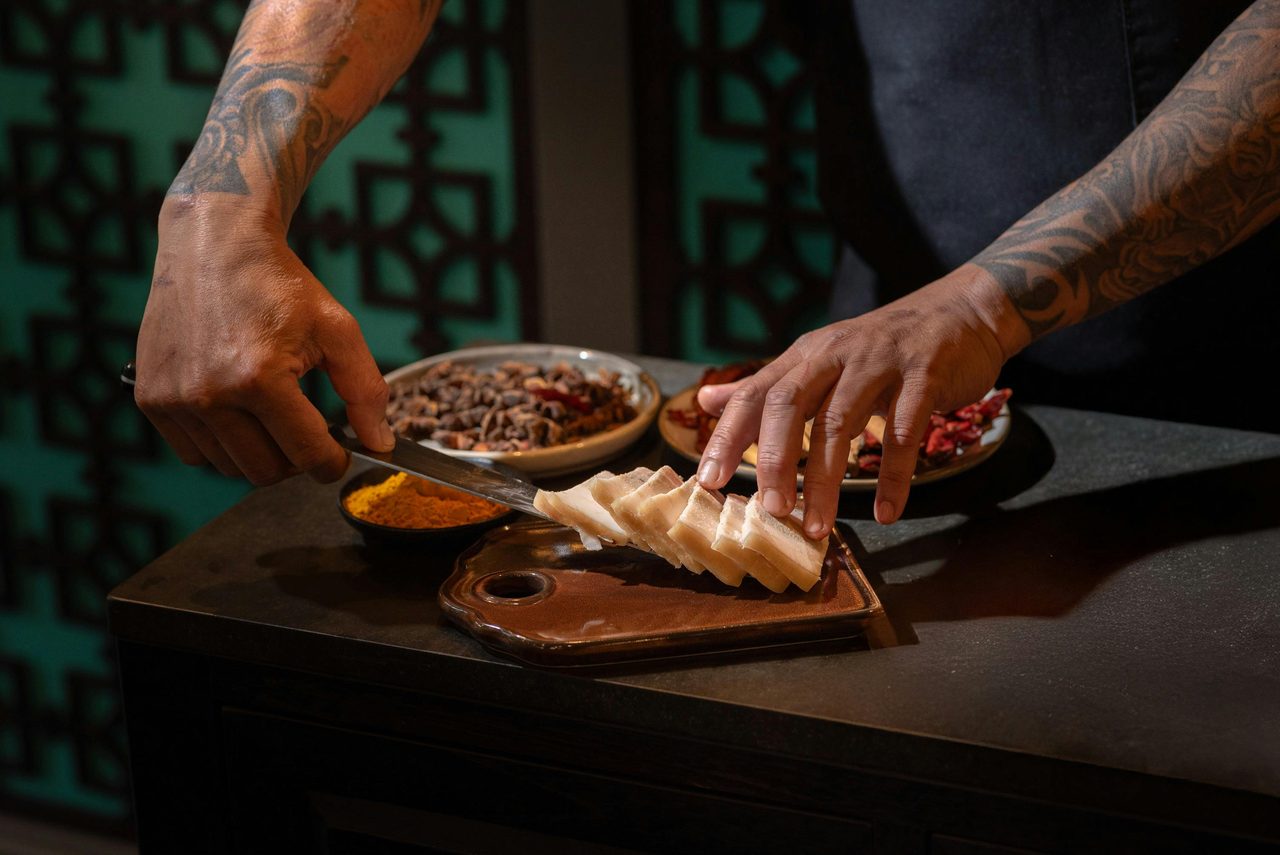 A chef preparing delicious meal options available at Miss Lilian Restaurant Blue Mountains NSW