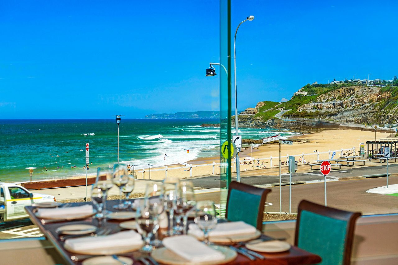 Tablet setting overlooking Newcastle Beach