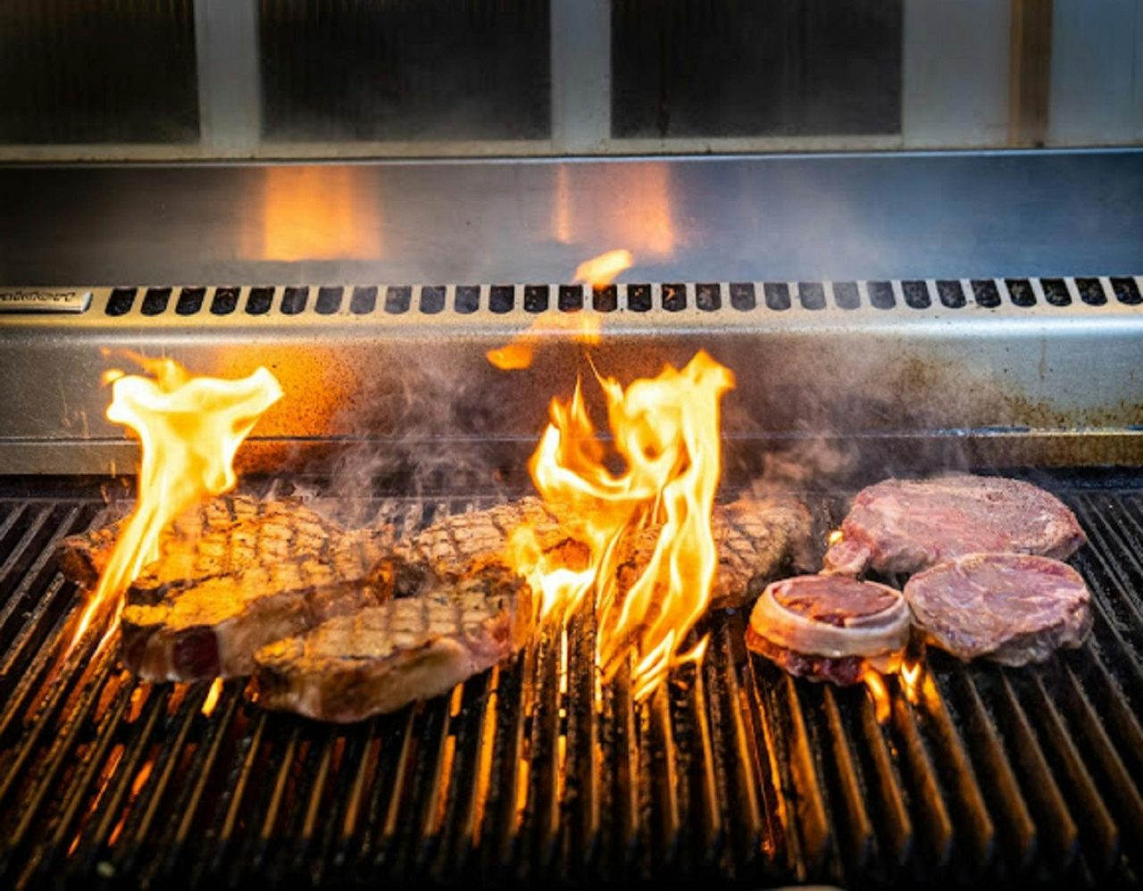 Steak and meats being grilled