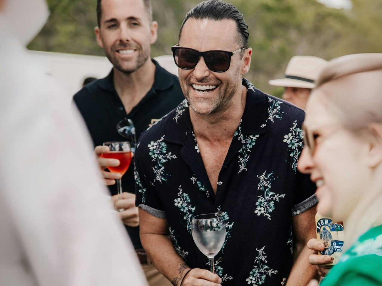 A Mate of Molly Morgan Wines laughing and enjoying wine