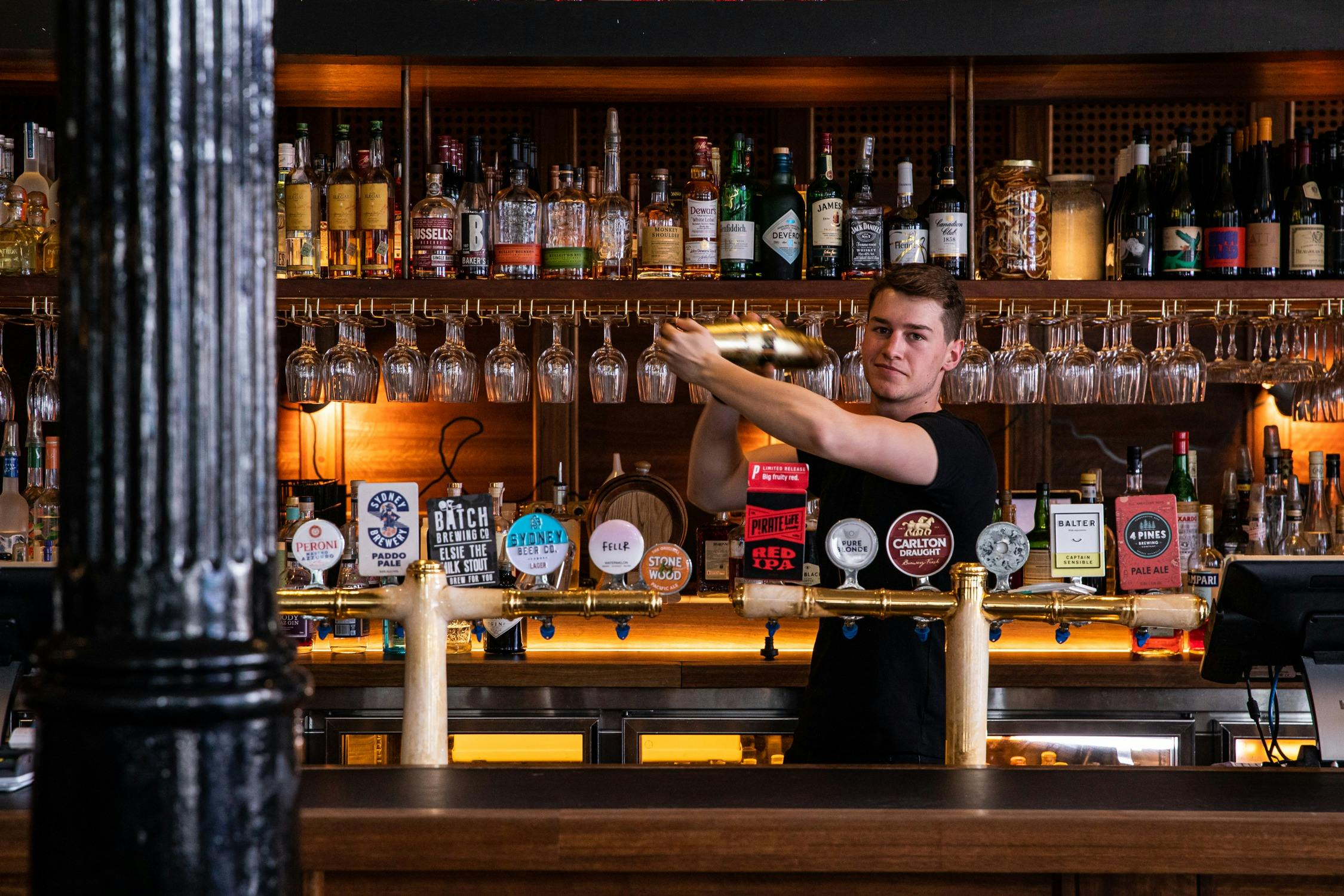 Bartender shaking cocktail