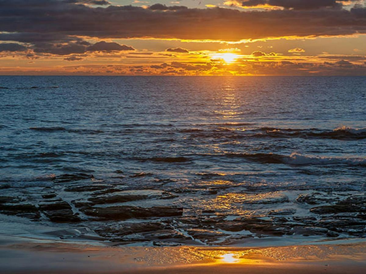 Sunrise over the water at Jervis Bay National Park. Photo: Michael Van Ewijk &copy; DPIE