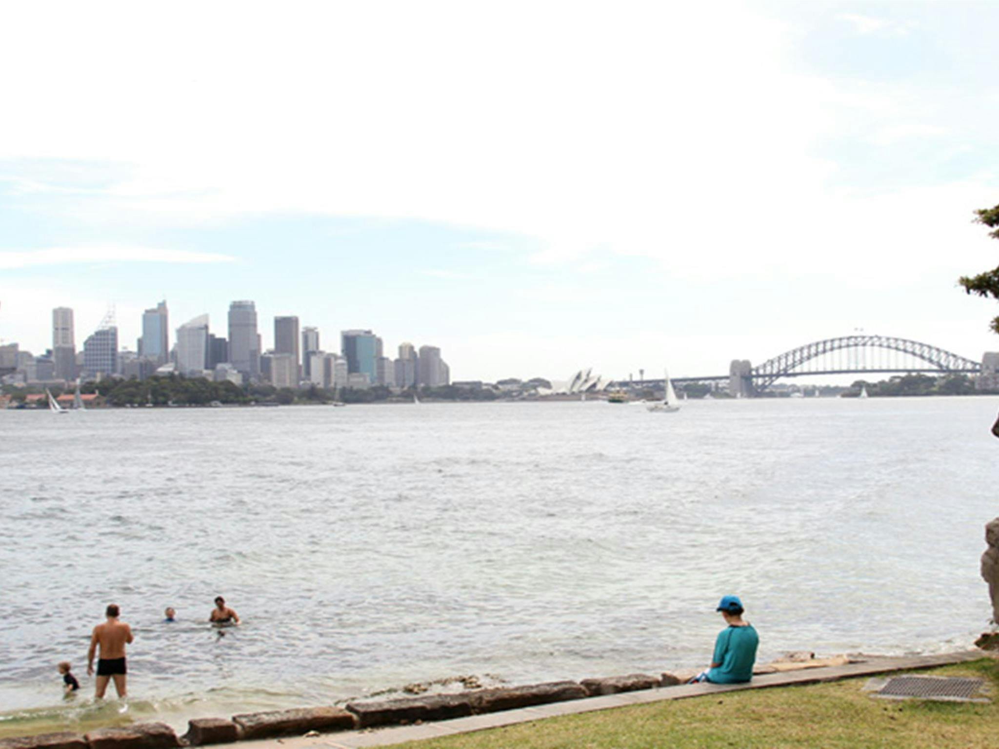 Family at Bradleys Head – Booraghee. Photo credit: John Yurasek &copy; DPIE