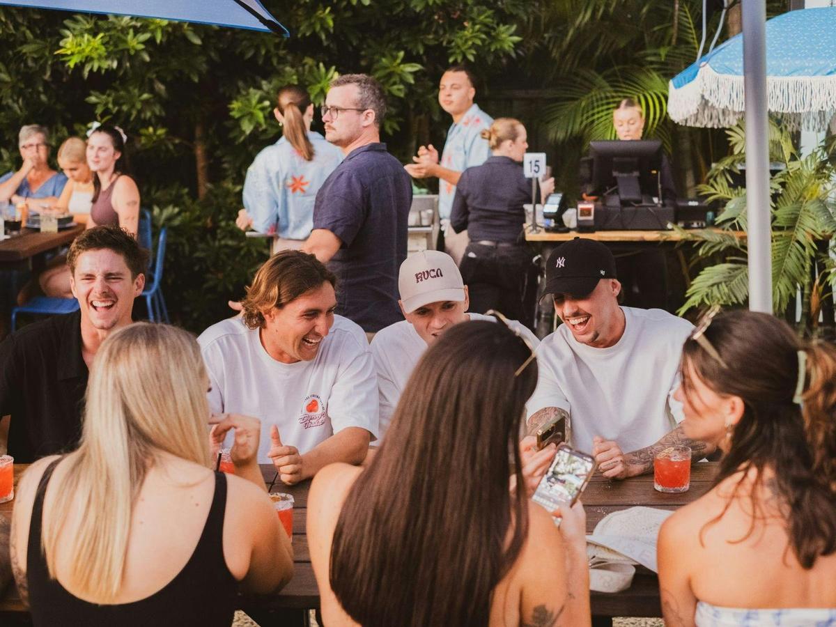 Groups of people sitting in the beer garden at Settlers Inn Port Macquarie