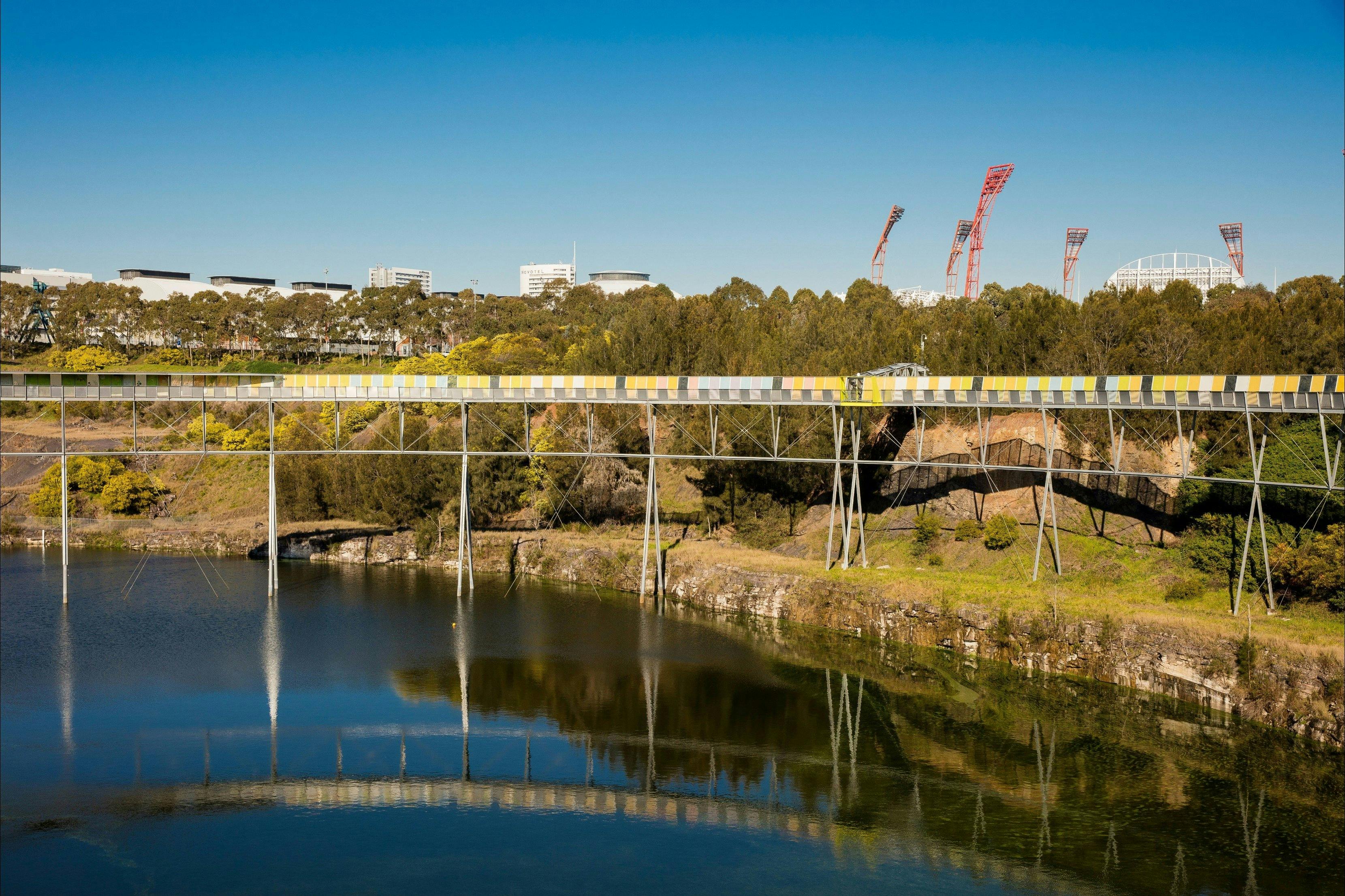 The Brickpit Walk sits 18.5m high over the historic Brickpit Pond in Sydney Olympic Park