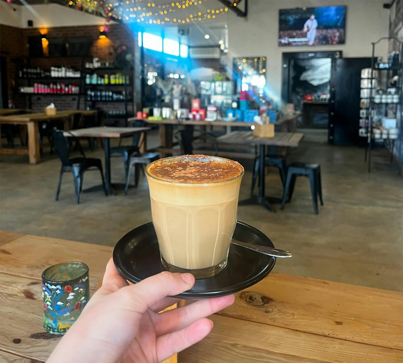 Stones Throw enjoying a latte